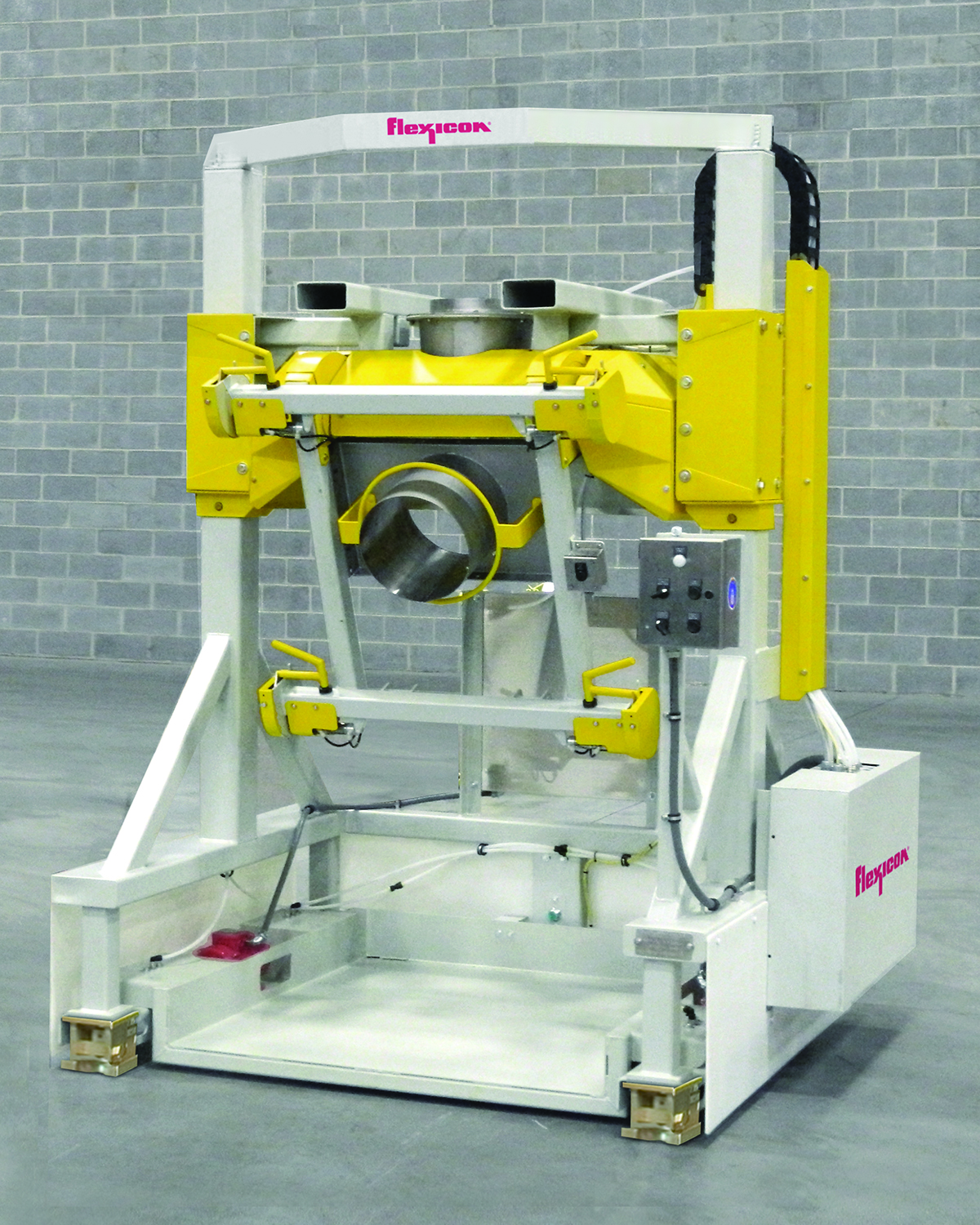 Flexicon's Rear-Post Bulk Bag Filler with Swing-Down fill head and low profile deck allows safe, rapid spout connections and removal of filled bags using a pallet jack